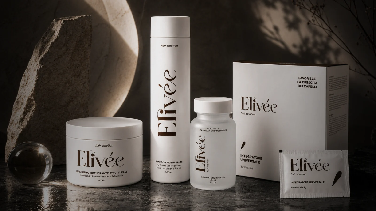 Linea Elivée hair solution con shampoo, maschera e integratori.